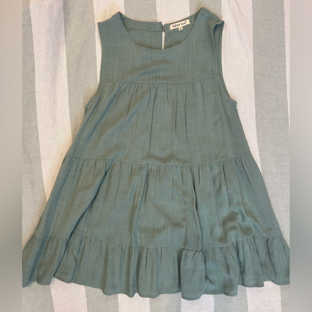 Light teal dress.